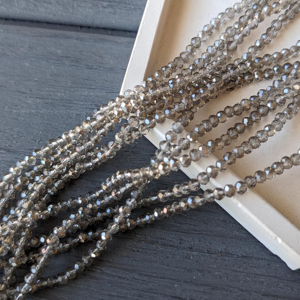 Kryštál Rondel, sivý, priehľadný, 2,5 mm