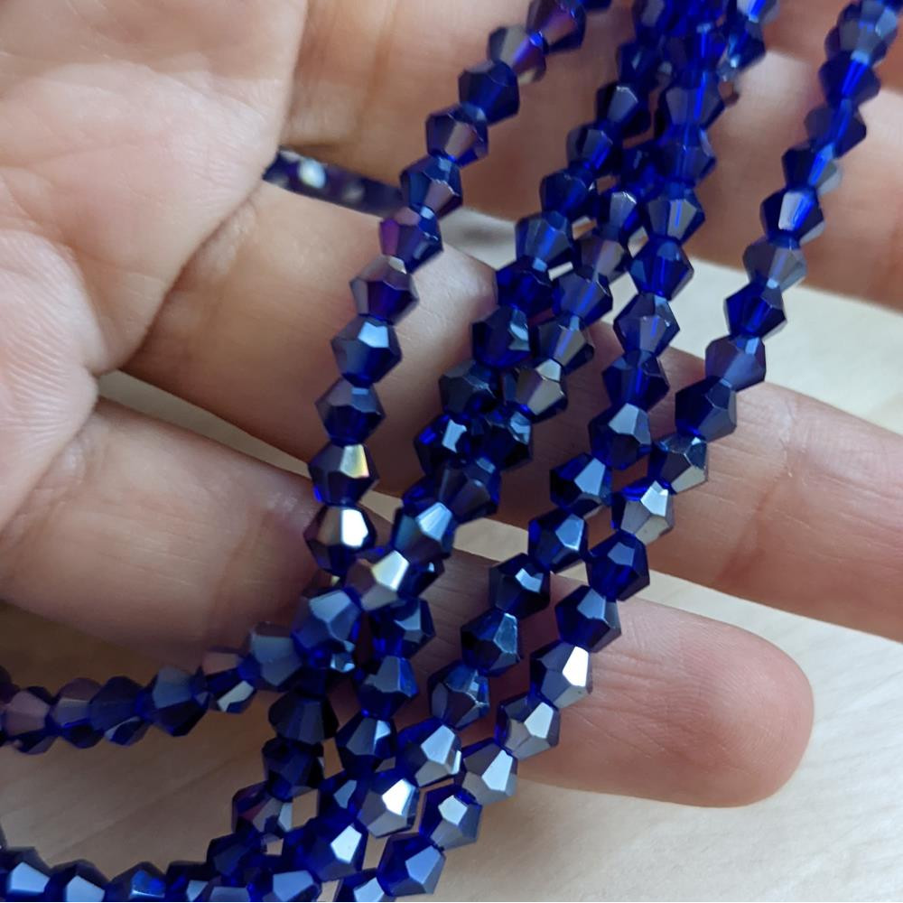 Dvojkužeľ tmavomodrý priehľadný AB 4 mm