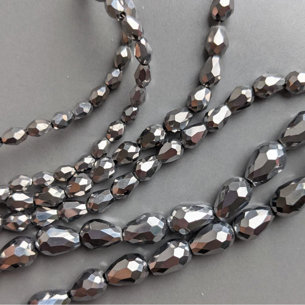 Strieborná krištáľová kvapka 8*12, 58 korálok