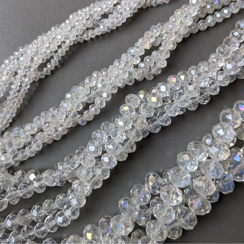 Crystal Rondel transparent AB 6 mm 90 ks.