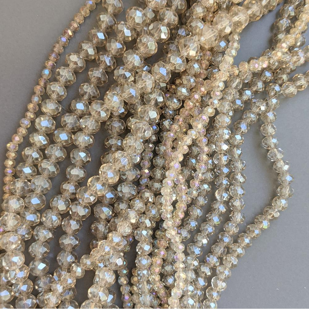 Crystal Rondel piesková transparentná AB 8 mm 65 ks.