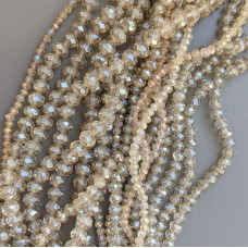 Crystal Rondel piesková transparentná AB 8 mm 65 ks.